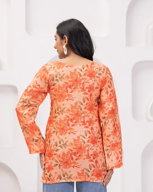Elevate your wardrobe with this stunning floral tunic top