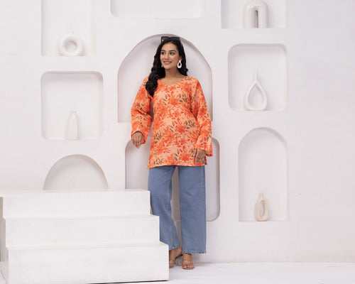 Elevate your wardrobe with this stunning floral tunic top